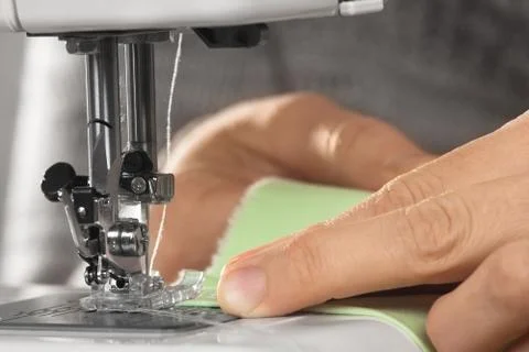 The sewing machine works, closeup Stock Photos