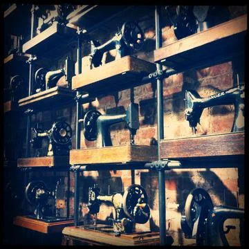 Sewing Machines On The Wall Stock Photos