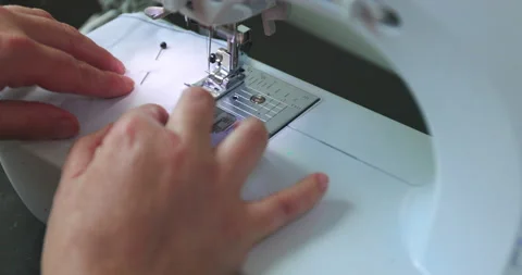 Sewing A Mask - 120 FPS Stock Footage 136782465