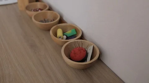 Sewing Material in many small Cups Stock Footage 99940286