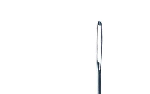 Sewing Needle Eye Close Up Stock Photos