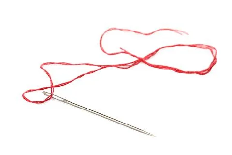 Sewing needle with red thread isolated on white Stock Photos