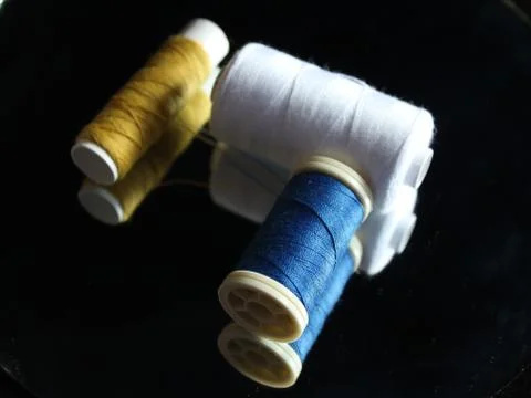 Sewing Needle thread scissors thimble tailor buttons Stock Photos