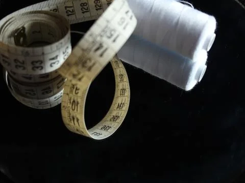 Sewing Needle thread scissors thimble tailor buttons Stock Photos