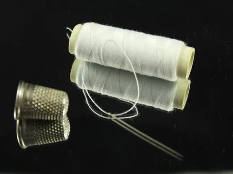 Sewing Needle thread scissors thimble tailor buttons Stock Photos