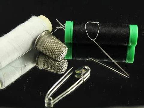 Sewing Needle thread scissors thimble tailor buttons 写真素材