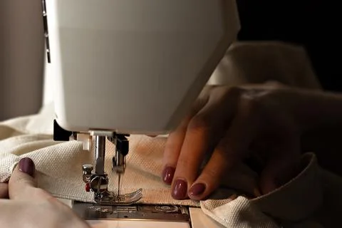 Sewing process close-up. lady tailor creates new types of clothing Foto stock
