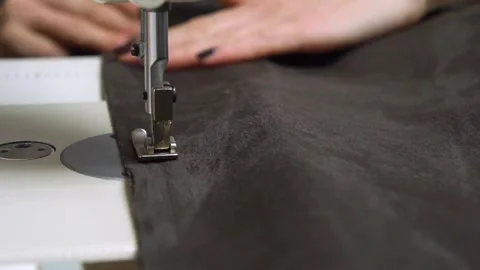 The Sewing Process with a Focus on the Importance of Needle and Fabric Selection Stock Footage 310260164