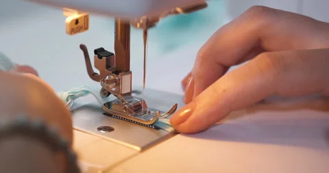 Sewing process, needlework close-up. Tailor makes clothes part with machine. Stock Footage 153010770