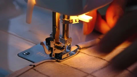 Sewing process on a sewing machine, a ne... | Stock Video | Pond5