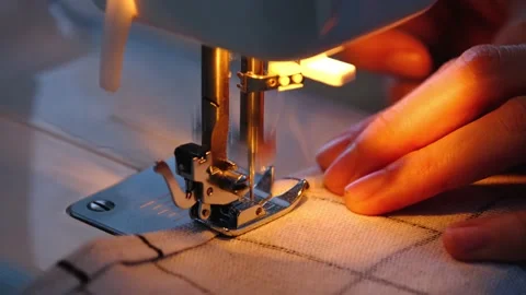 Sewing process on a sewing machine, a ne... | Stock Video | Pond5