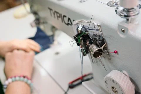 Sewing school uniforms Stock Photos
