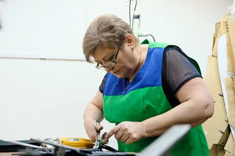 Sewing school uniforms Photos