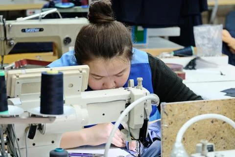 Sewing school uniforms Photos