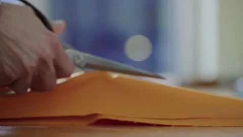 Sewing scissors cutting fabric. Pattern making process. Clothmaking design. Video stock 209185853