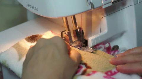 Sewing With a Serger Machine Stock Footage 42860779