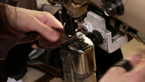Sewing on a sewing machine. Clouse up Stock Footage 169479143