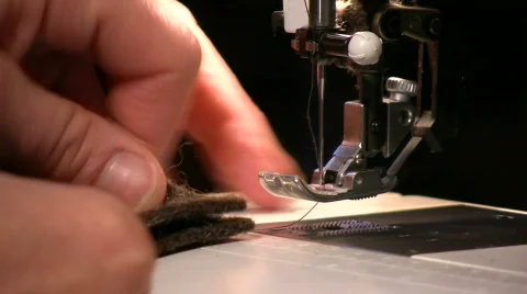 Sewing on a sewing machine Stock-Footage 542933
