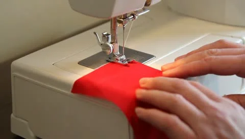 Sewing on sewing machine Stock Footage 10920955