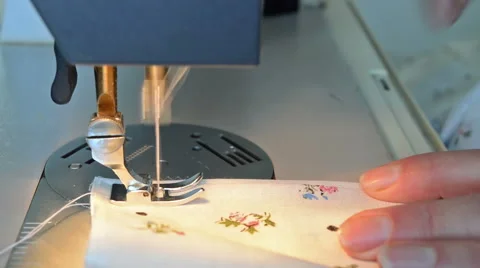 Sewing on a sewing machine Stock Footage 61908037