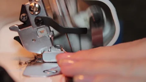 Sewing on the sewing machine Stock Footage 70902037