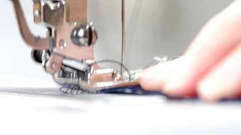 Sewing on the sewing machine Stock Footage 127240791