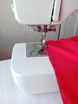 Sewing on a sewing machine Stock Photos