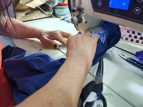 Sewing with a Sewing Machine Stock Photos