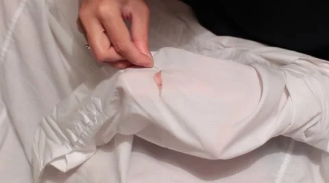 Sewing the shirt. Stock Footage 65813416