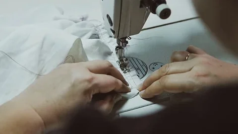 Sewing in slow motion. Close up. Video stock 69075694
