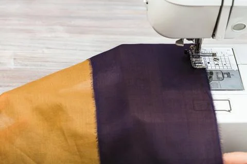 Sewing strips of fabrics for patchwork Stock Photos