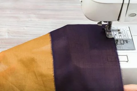 Sewing strips of fabrics for patchwork workshop on sewing a patchwork scar... Stock Photos