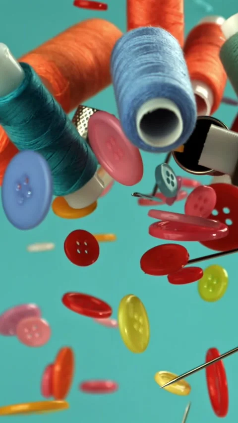 Sewing supplies fly on a blue background. Filmed on a high-speed camera at 1000 Stock Footage 335366559