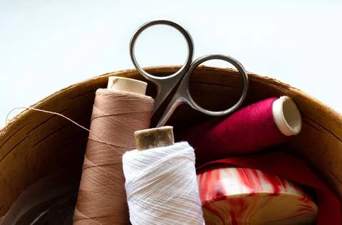 Sewing supplies. spools of thread and scissors. Stock Photos