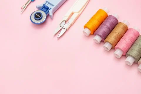 Sewing Supplies With Thread And Tools On Pink Stock Photos