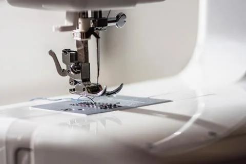 Sewing, tailoring. Sewing machine white. Foto stock