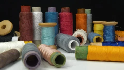 Sewing. Textile production. Spools of multi-colored threads Stock Footage 319445098