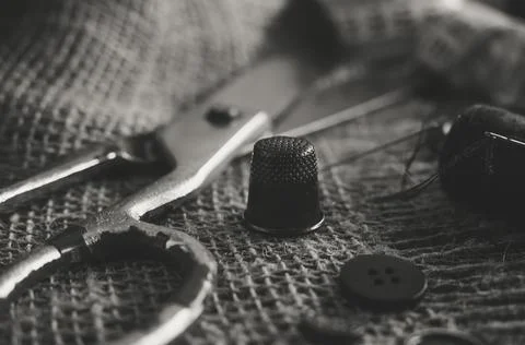 Sewing Thimble. Needle and thread. Scissors and a centimeter are the tools of Stock Photos