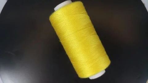 Sewing thread close up from above Stock Footage 332260375