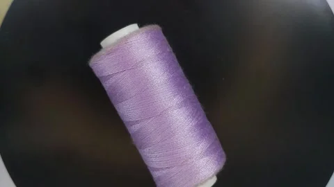 Sewing thread close up from above10 Stock Footage 332260551