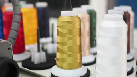 Sewing thread colors in a craft shop display Stock Footage 335065961