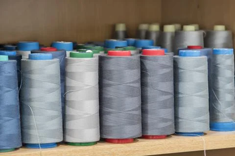 Sewing thread cones closeup Stock Photos