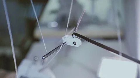 Sewing thread moving to the machine Stock-Footage 69076307