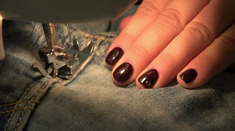 Sewing thread on a sewing machine clothing Stock Footage 43395239