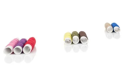 Sewing thread spool isolated on white Foto stock
