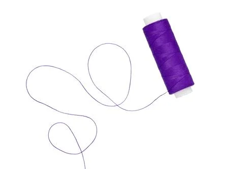 Sewing thread spool isolated on white. Stock Photos