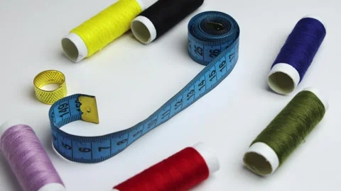 Sewing Thread Spools and Tape Measure Flat Lay 動画素材 346484676