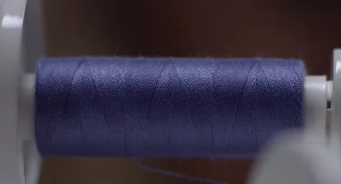 The sewing thread is unwound Stock Footage 146201912