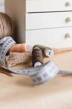 Sewing Threads on the Background of the Storage Box. Tailor Concept. Copy Spa Stock Photos