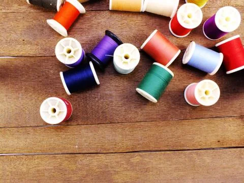 Sewing threads as a multicolored background close up Stock Photos